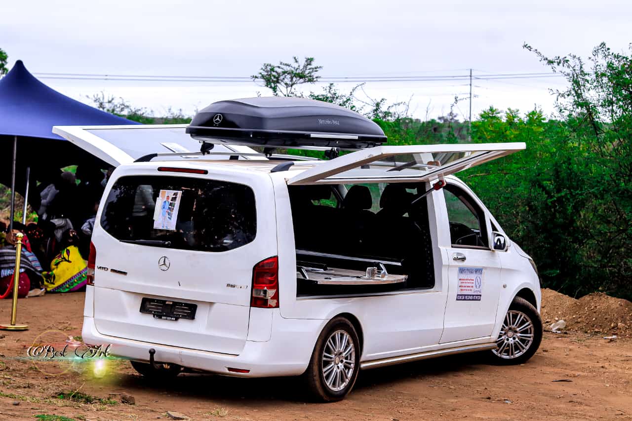 White funeral hearse prepared for service